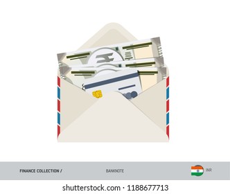 500 Indian Rupee Banknote. Flat style opened envelope with cash. Indian Rupee banknotes and credit card. Salary payout or bank transaction concept.