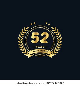 52th golden anniversary logo, with shiny ring and golden ribbon, laurel wreath isolated on navy blue background