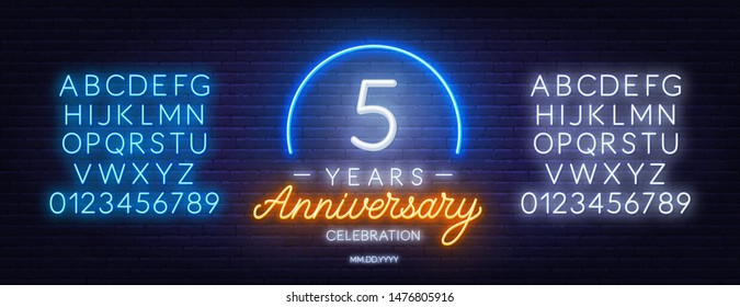 5th anniversary celebration neon sign on dark background. Neon alphabet . Template for invitation or greeting card.