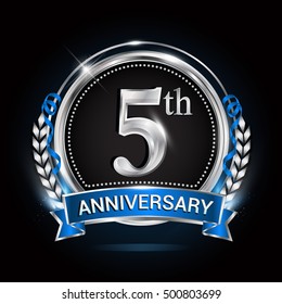 5th silver anniversary logo with blue ribbon and ring.