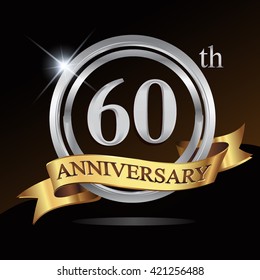 60th anniversary logo, with shiny silver ring and gold ribbon isolated on black background. vector design for birthday celebration.