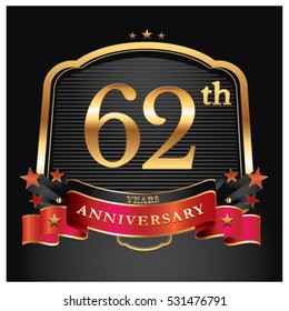 62 years golden anniversary logo celebration with ring and ribbon.