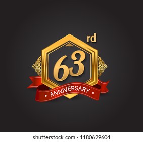63rd anniversary design logotype style with golden hexagon, ornament and red ribbon for use in celebration event.