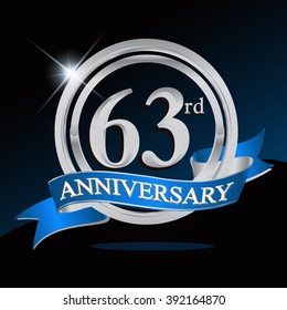 63rd anniversary logo with blue ribbon and silver ring, vector template for birthday celebration.