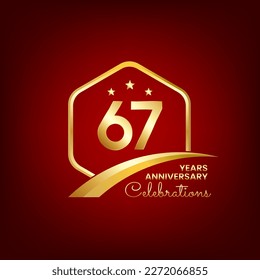 67 years anniversary inside of gold hexagon and curve with red backgrounds