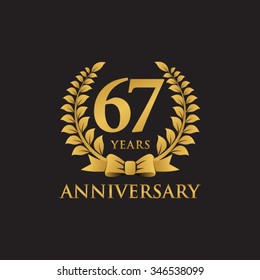 67 years anniversary wreath ribbon logo black background