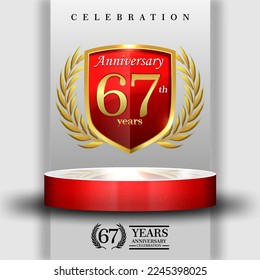 67 years gold anniversary celebration logo with 3d red cylinder podium , isolated on grey background