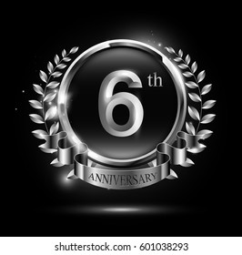 6th silver anniversary celebration logo with ring and ribbon, laurel wreath design