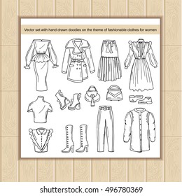 6-Vector set with hand drawn isolated doodles of clothes for women. Doodles on the theme of fashion and beauty. Sketches for use in design