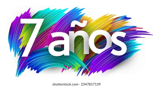 7 years at spanish paper word sign with colorful spectrum paint brush strokes over white. Vector illustration.