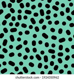 70s 80s 90s vector retro japanese fashion seamless pattern in green and black colors. Exotic Leopard texture ornament with big dots and ovals on green background. Endless vintage fashion design.