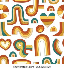 70s retro rainbow vector seamless pattern. Groovy vintage repeat pattern with arch, circle, heart and rainbows shapes. Wavy geometric hippie print for wallpaper, fabric, wrapping. Abstract background.