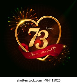 73 years anniversary logo golden colored,with love shape, red ribbon, and fireworks background