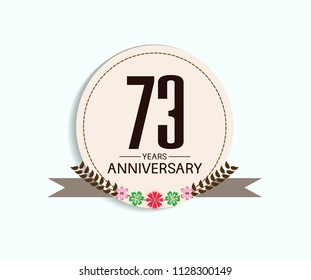 73 years anniversary with vintage style soft brown circle and flower isolated on white background for special celebration event