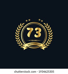 73th golden anniversary logo, with shiny ring and golden ribbon, laurel wreath isolated on navy blue background