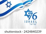 76 years anniversary Israel Independence Day with wawing flag on wooden board. 76th years Yom Ha