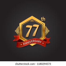 77th anniversary design logotype style with golden hexagon, ornament and red ribbon for use in celebration event.