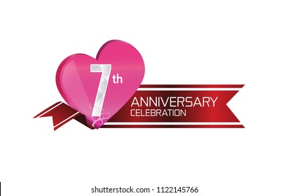 7th anniversary celebration with pink heart and red ribbon isolated on white background