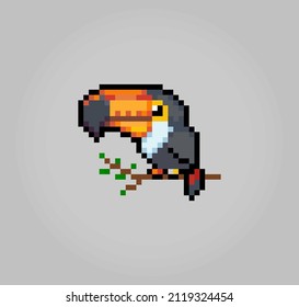 8 bit pixel toucan bird. Animal pixel in vector illustrations for game assets and cross stitch patterns.