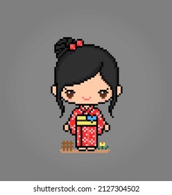 8 Bit Pixels Character Women Wear a Kimono Dress. Adult girl pixels in vector illustrations for game assets or cross stitch patterns.