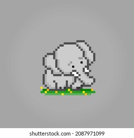 8 bit pixels elephant is sitting. Happy animals for game assets in vector illustrations.