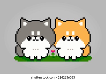 8 bit pixels of two Shiba Inu dog. Animal pixels for asset games or Cross Stitch patterns in vector illustrations.