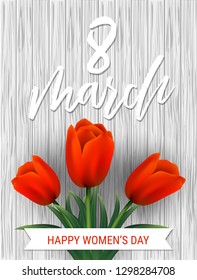 8 March. Women's Day greeting card with red tulips flowers on grey wood background