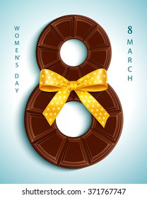 8 March, Womens Day. Greeting card with chocolate and yellow bow