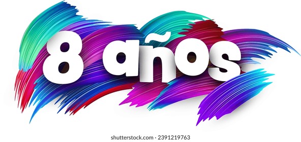 8 years at spanish paper word sign with colorful spectrum paint brush strokes over white. Vector illustration.