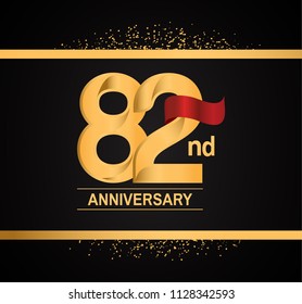 82 anniversary golden design with red ribbon and glitter isolated on black background for celebration