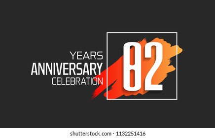 82 years anniversary celebration logotype with orange brush and square isolated on black background for use special celebration event