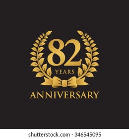 82 years anniversary wreath ribbon logo black background