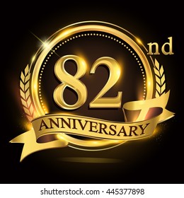 82nd golden anniversary logo with ring and ribbon, laurel wreath vector design.