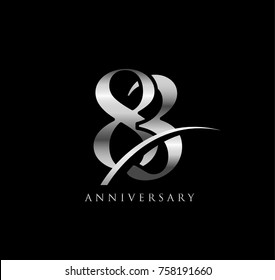 83 anniversary elegance silver chrome logo. linked number with swoosh on black background