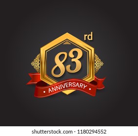 83rd anniversary design logotype style with golden hexagon, ornament and red ribbon for use in celebration event.