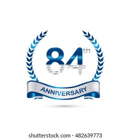 84th anniversary blue and silver colored with wreath and ribbon
