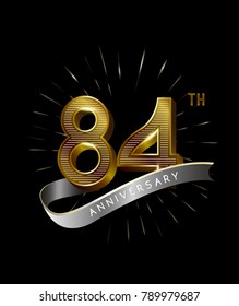 84th Anniversary fireworks and ahiny ribbon. gold anniversary logo on black background