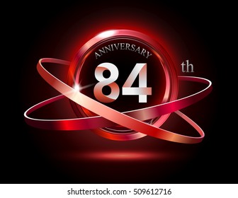 84th anniversary with shiny red ring on black background