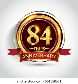 84th golden anniversary logo, eighty four years birthday celebration with ring and red ribbon isolated on white background