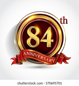 84th golden anniversary logo, eighty four years birthday celebration with ring and red ribbon isolated on white background