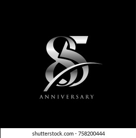 85 anniversary elegance silver logo. linked number with swoosh on black background