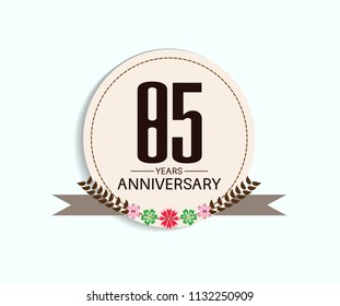 85 years anniversary with vintage style soft brown circle and flower isolated on white background for special celebration event