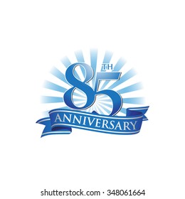 85th anniversary ribbon logo with blue rays of light