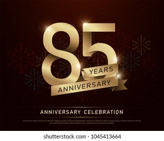 85th years anniversary celebration gold number and golden ribbons with fireworks on dark background. vector illustration