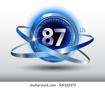 87th anniversary with blue ring and laurel on white background