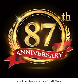 87th golden anniversary logo, with shiny ring and red ribbon, laurel wreath isolated on black background, vector design