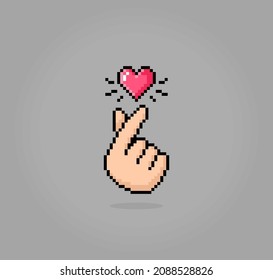 8-bit pixel of finger heart image. vector illustration of cross stitch pattern. Korean love sign for t-shirt design.