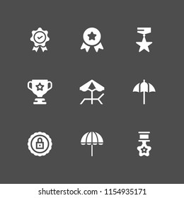 9 award icons in vector set. medal, umbrella, trophy and prize illustration for web and graphic design