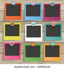 9 photo frames with camera icons on the wooden background. Eps 10 vector file.