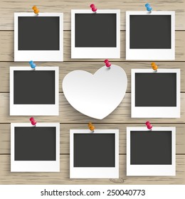 9 Photo Frames With White Paper Heart On The Wooden Background. Eps 10 Vector File.